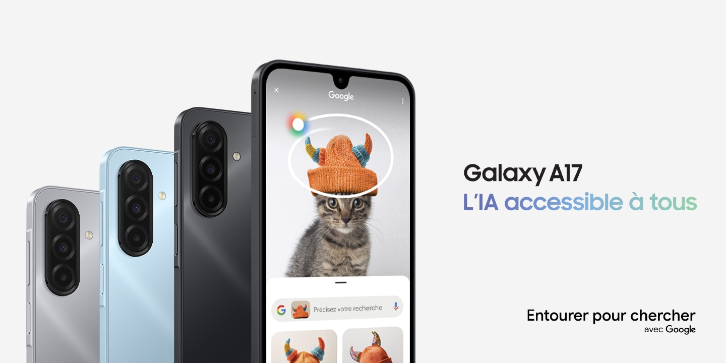 Trois smartphones Samsung Galaxy A17 Gris, Bleu clair et Noir sont de dos pour montrer leurs triples capteurs photographiques Ultra grand-angle 5 MP, principal 50 MP avec stabilisation optique (OIS) et Macro 2 MP. Un quatrième smartphone A17 au premier plan est Noir et de face. Son écran présente une recherche « Entourer pour chercher avec Google » dans laquelle un chaton avec un bonnet orange est entouré d’un lasso multicolore pour illustrer la recherche d’image. Le titre est : Galaxy A17. L’IA accessible à tous.