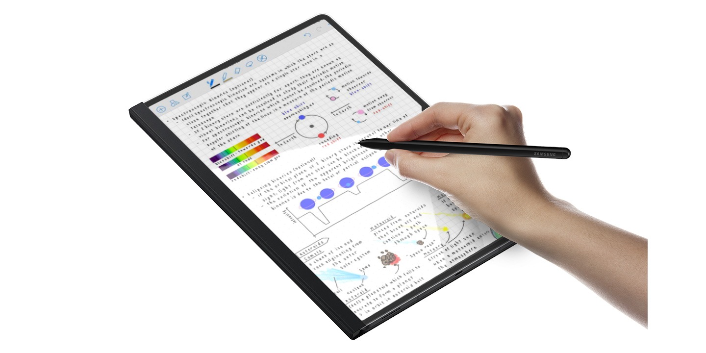 A Galaxy Tab S8 Ultra device in a Tab S8 Ultra Note View Cover shown with a person's hand writing notes using an S Pen.