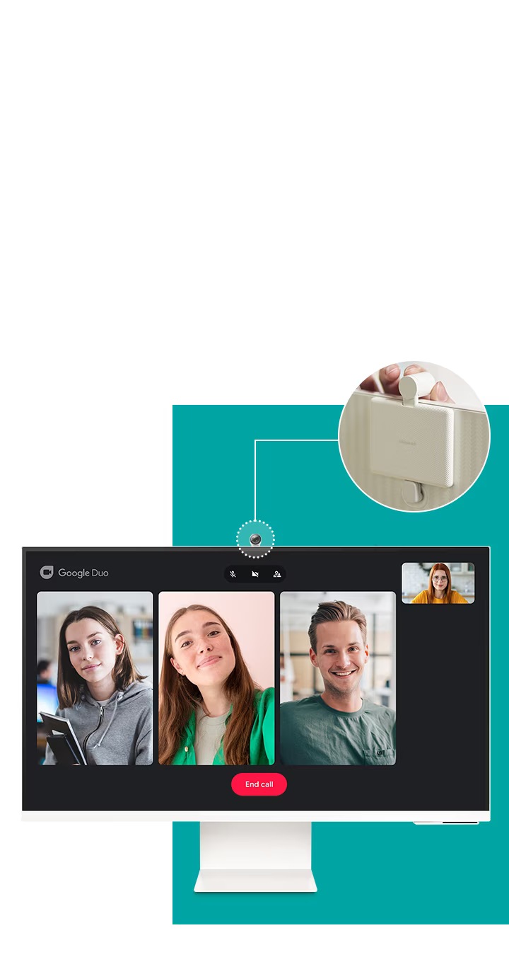 The monitor now has a circular camera attached to its top. On the screen shows the interface of the Google Duo chat application with three other users participating in a video call.