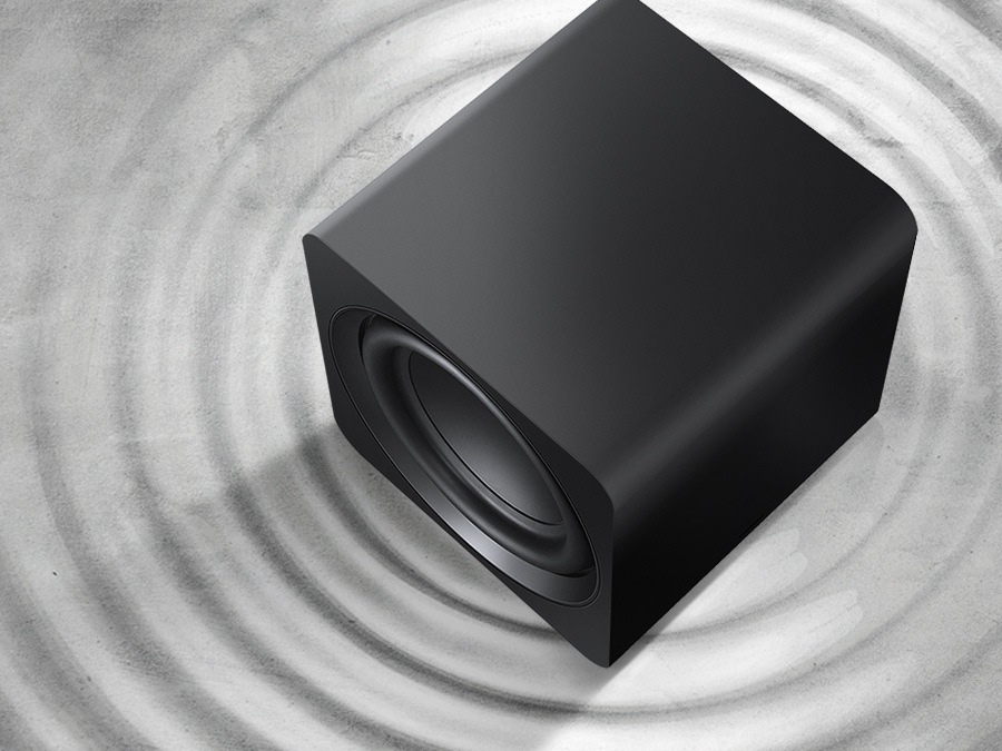Vibration rings expand from a Samsung subwoofer on beat with the music to show the soundbar's powerful bass.