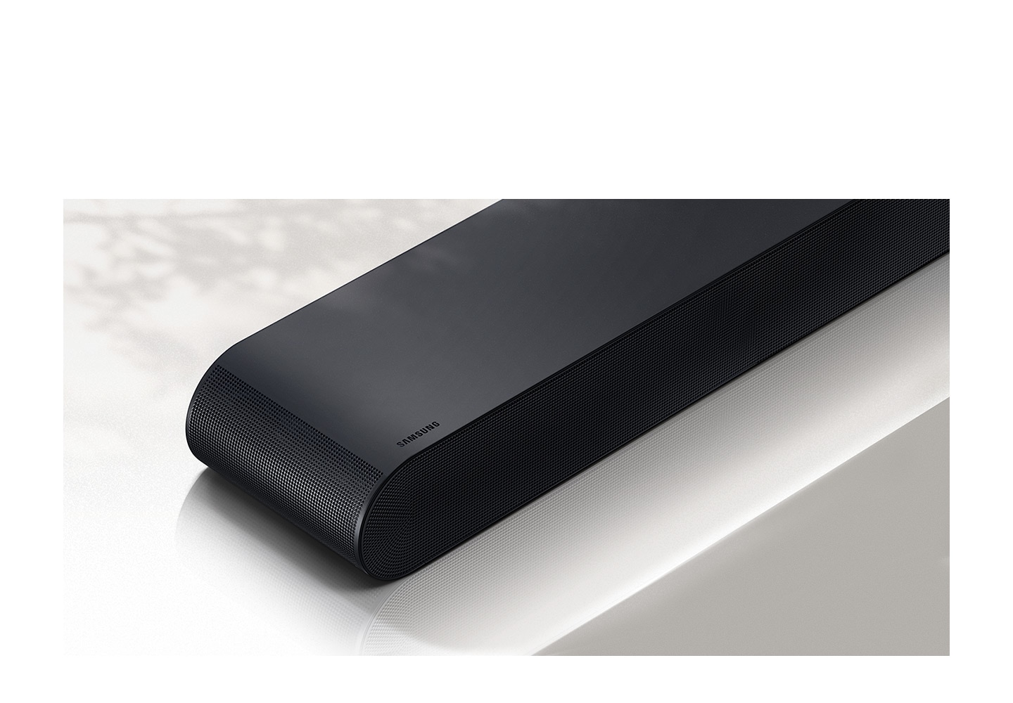 Closeup view of S60B soundbar which is shown in front with Samsung logo visible.