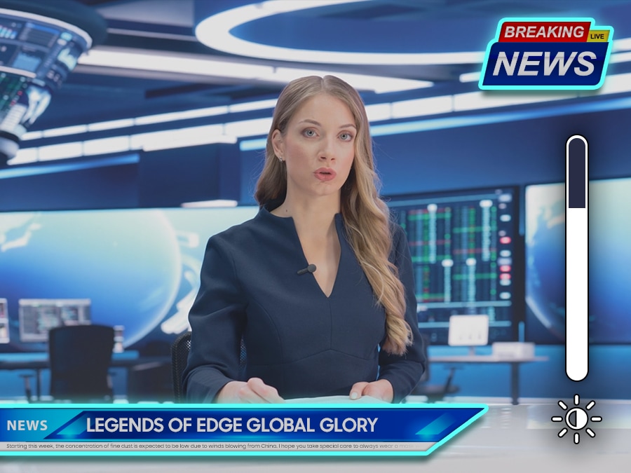 A newscaster sits at a desk, reporting on a breaking news story. A badge saying "Breaking News" is in the top right, with a  lower third saying "Legends of Edge Global Glory." And they are being highlighted, while its brightness is being reduced. 