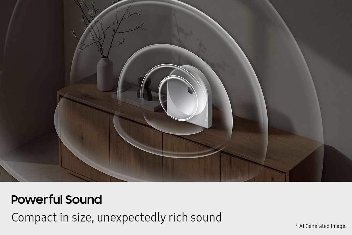 Music Studio 5 speaker sits on a wooden cabinet. Sound waves radiate outward from the speaker, expanding in smooth, layered arcs that fill the room to show its powerful sound. Image is AI-generated.