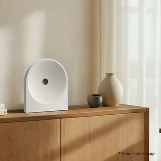 Music Studio 5 speaker displayed on a wooden cabinet in a bright, minimalist living space. Natural light filters through sheer curtains, with ceramic vases and books styled nearby. AI-generated image.