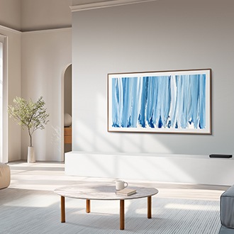 The Frame TV mounted flush on a bright living room wall, displaying blue abstract artwork that blends naturally with the decor. AI Generated Image.