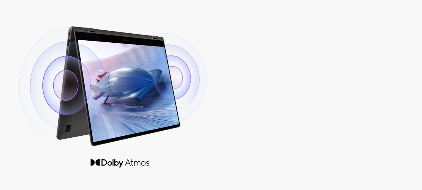 A graphite Galaxy Book3 360 is folded like a tent, facing slightly to the right with a bobsleigh shown onscreen and sound waves coming out of the two speakers. Dolby Atmos logo is shown.