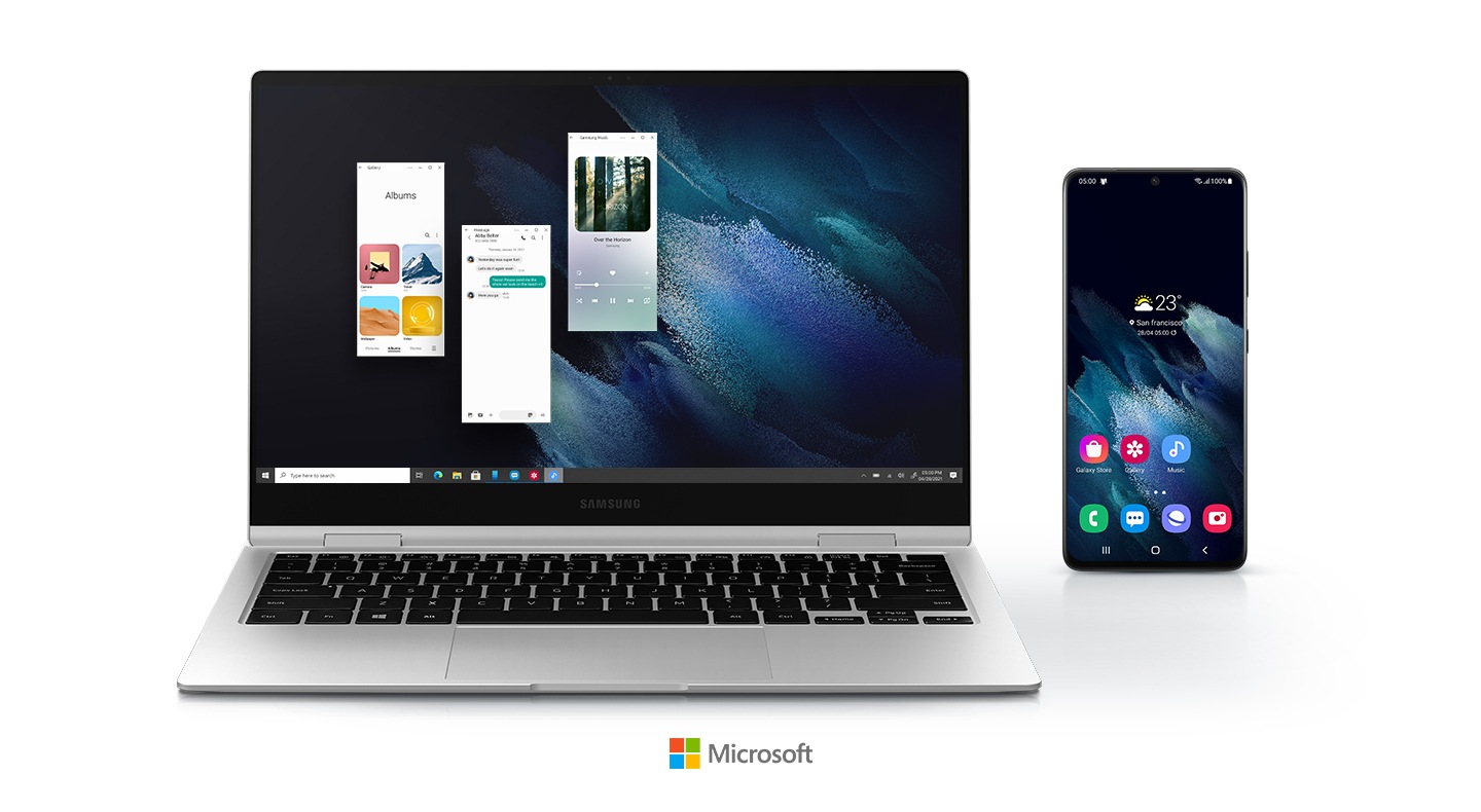 Tiga aplikasi Android sedang dijalankan di Galaxy Book Pro 360 5G menggunakan aplikasi telepon Anda. Ponsel ditempatkan tepat di sebelah laptop, menampilkan layar dengan 7 ikon aplikasi di atasnya, yang berarti aplikasi dapat dioperasikan di laptop tanpa menggunakan ponsel. Logo Microsoft ditempatkan di bagian bawah