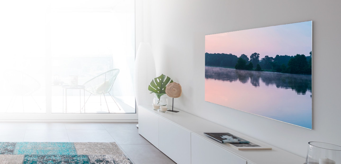 A TV is hanging on the wall via a Full Motion Slim Wall Mount.