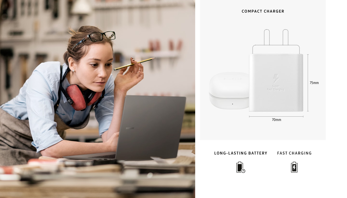 A woman is using a graphite-colored Galaxy Book3 Ultra on a table next to some tools in a workshop. A Galaxy Book3 Ultra charger is placed next to a Galaxy Buds2 Pro case. The dimensions of the main body of the charger are 70mm horizontally and 75mm vertically. "COMPACT CHARGER". "LONG-LASTING BATTERY" and "FAST CHARGING" are shown.