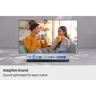 A TV displays a scene of two women chatting. Below it, a soundbar plays the sound at a volume suitable for dialog.