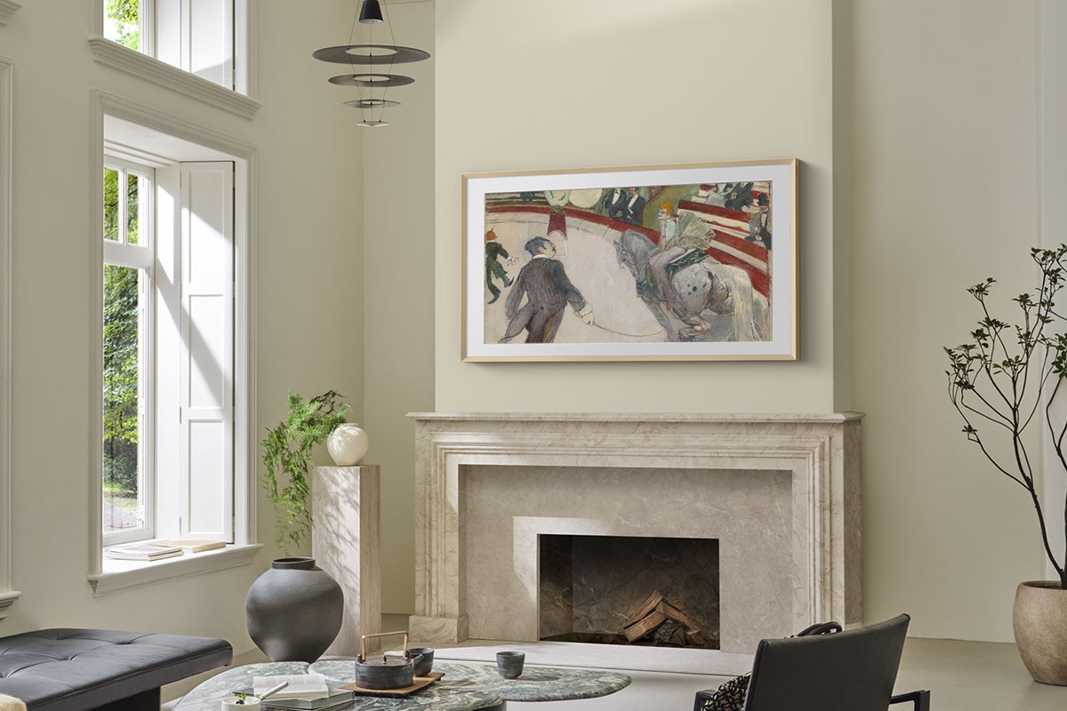 The Frame is mounted to a wall in a living room.