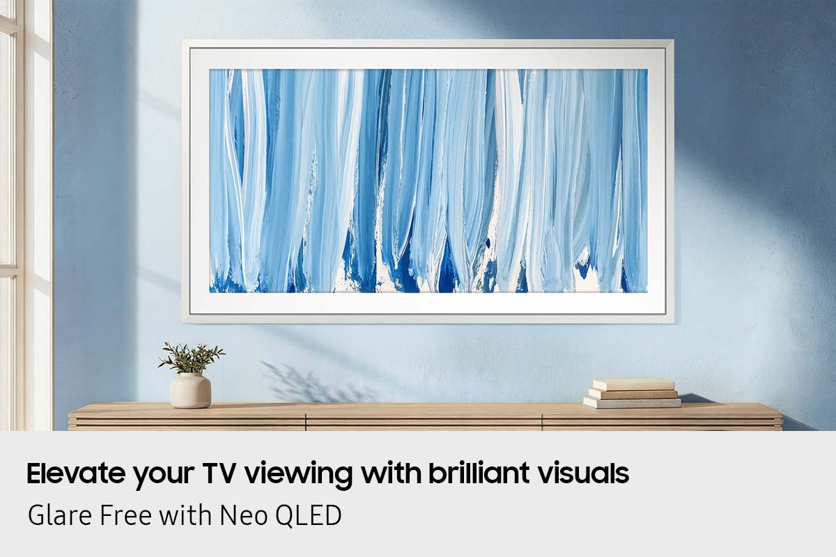The Frame TV displays an abstract blue artwork in Art Mode on a wall, with a glare-free Neo QLED screen preserving deep contrast, vivid color, and fine texture.