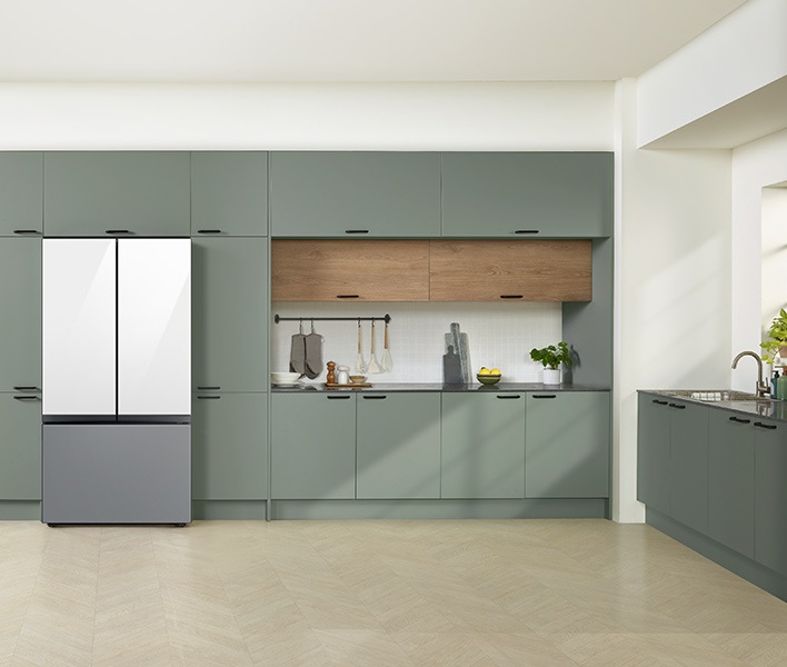 Bespoke Refrigerator with three door with minimalist design harmoniously fits well into a seamless and trendy kitchen interior.