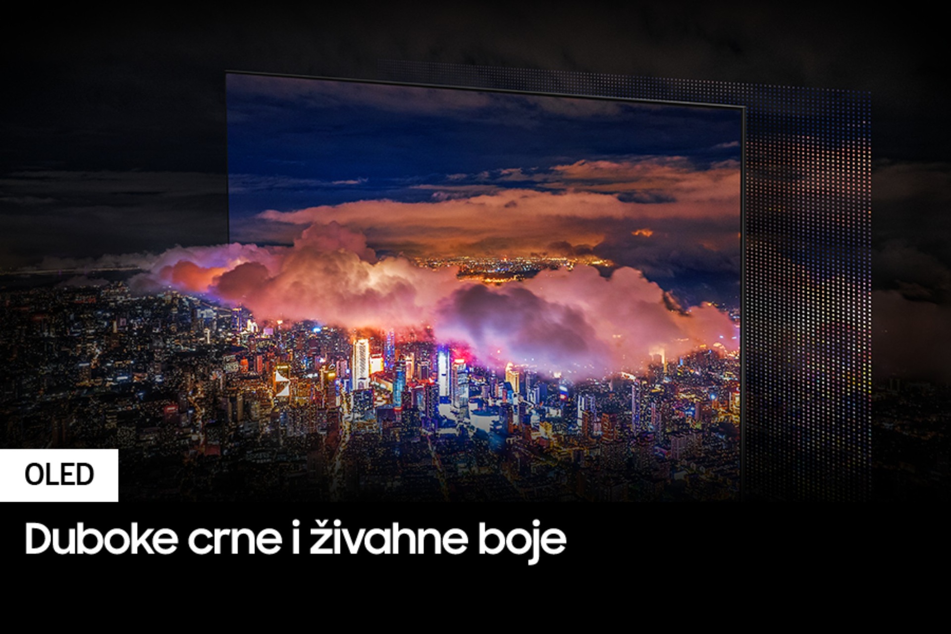 Prikazan je grad obasjan jakim svjetlima. Boje i svjetla su živopisna kao što OLED svjetla prikazuju kroz QD zaslon.