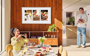 Two people watching TV.