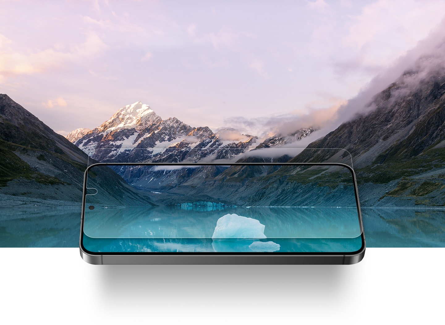 The Galaxy S24 Plus with the Anti-Reflecting Screen Protector is overlaid on a snowy landscape of mountains and a lake. The clarity of the landscape can be seen through the lenses-like transparency of the screen protector.
