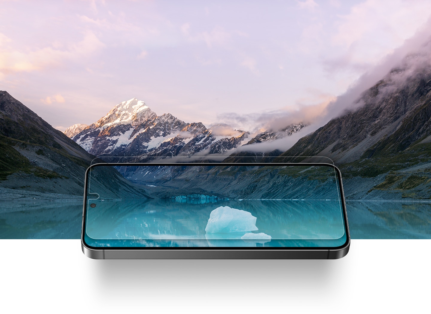 The Galaxy S24 with the Anti-Reflecting Screen Protector is overlaid on a snowy landscape of mountains and a lake. The clarity of the landscape can be seen through the lenses-like transparency of the screen protector.