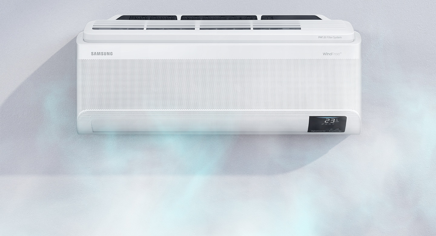Shows a wall-mounted air conditioner gently and quietly dispersing cool air through WindFree™ Cooling.