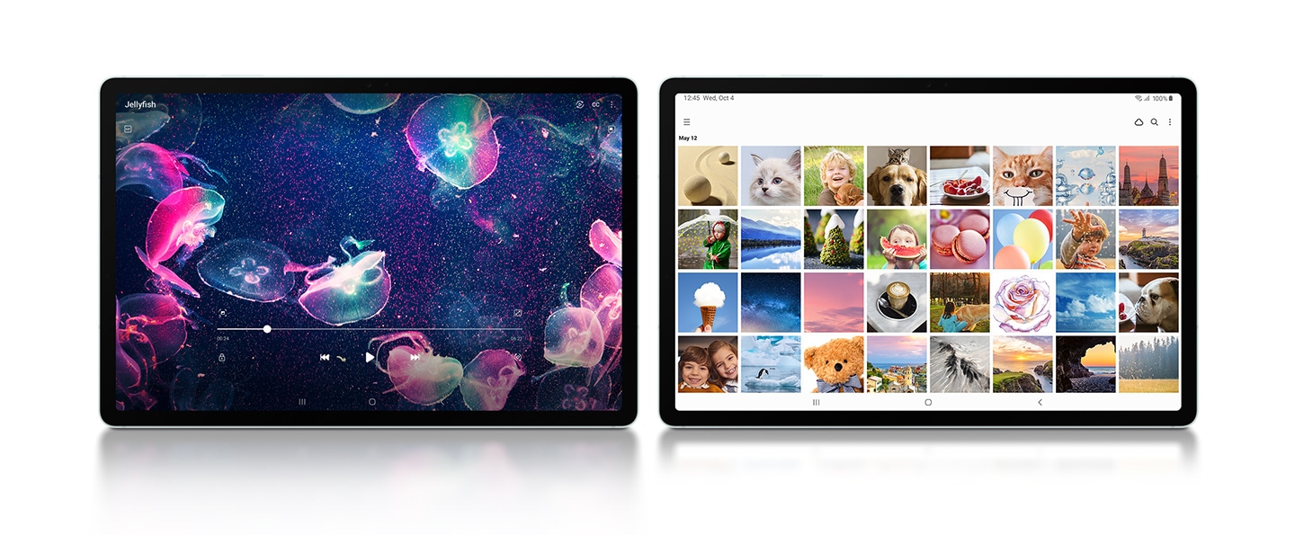Dua perangkat Galaxy Tab S9 FE+ warna Mint diletakkan bersebelahan dalam mode Lanskap, menghadap ke depan. Di sebelah kiri, terdapat video ubur-ubur warna-warni yang diputar dalam tampilan layar penuh. Di sebelah kanan, aplikasi Samsung Gallery terbuka dalam tampilan layar penuh.