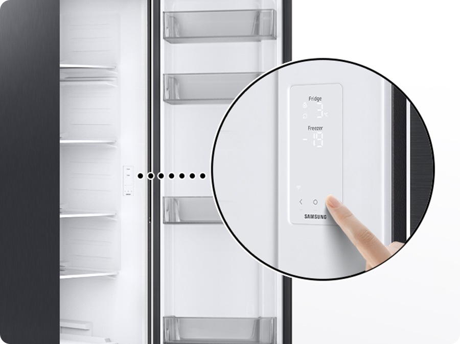 The control display is located in the middle of the right compartment wall of refrigerator. A person touches the control display. This is easily accessible to anyone.