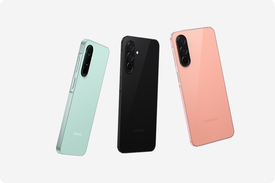 Three Galaxy A26 5G devices in Mint, Peach Pink and Black, showcasing their glass back featuring a 3-camera layout.