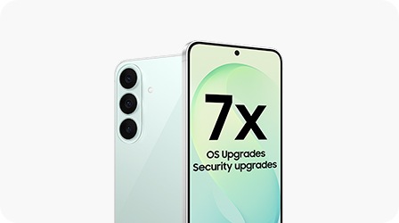 A Samsung Galaxy S26 FE smartphone with a Pistachio back and triple rear cameras is shown. The screen displays '7x OS Upgrades Security upgrades', highlighting extended software and security support.