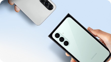 Galaxy A56 and boxed Galaxy S26 FE. Two devices are showing their backs, each held in a hand.