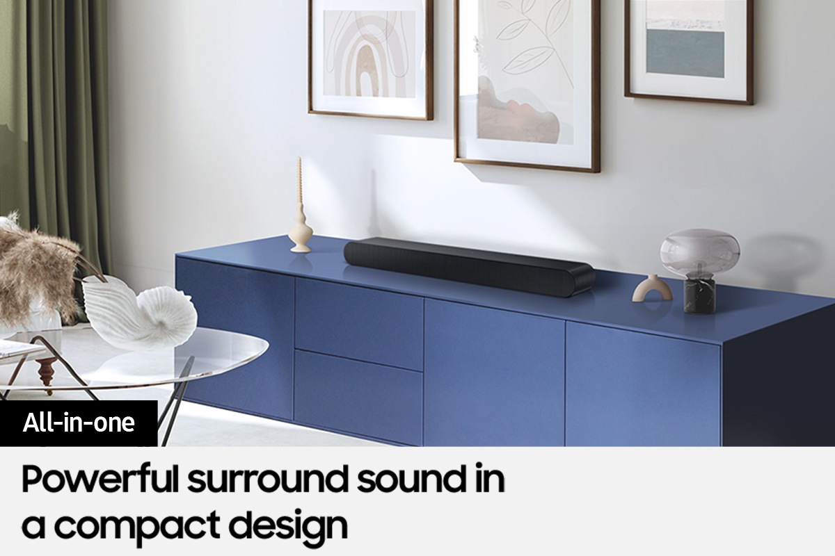 Samsung Soundbar S60D on a console stand in a living room.