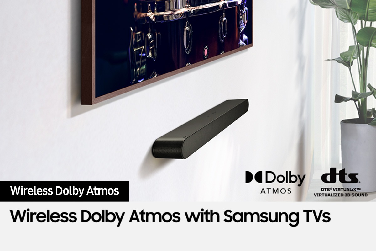 Samsung Soundbar connected wirelessly to TV. Dolby Atmos logo and DTS Virtual:X logo.