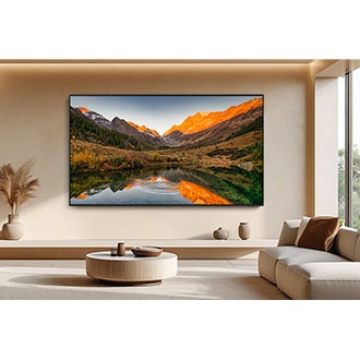 Large Samsung Neo QLED TV in modern living room displays a crisp natural landscape scene.