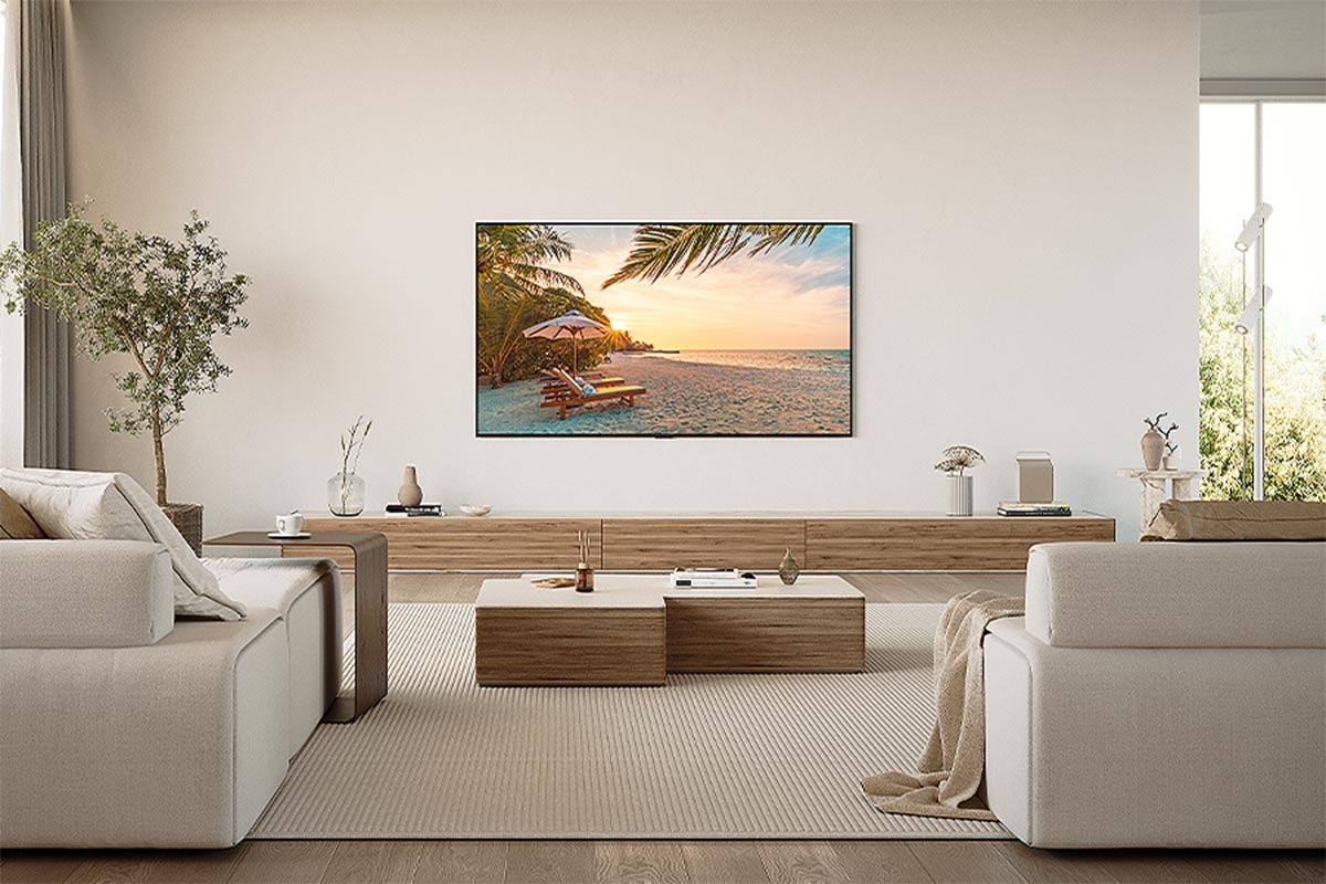Wall-mounted Q80D in a natural white-toned living room.