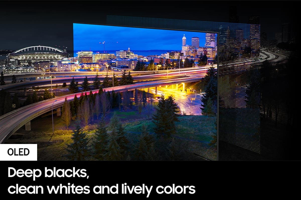 A city lit up by bright lights is on display. The colors and lights are vivid as OLED lights portray through the QD screen.