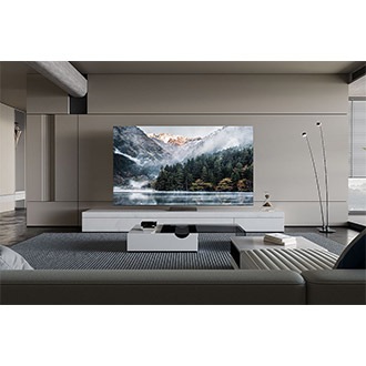 QN900D sits elegantly on top of a console in a neutral living room.