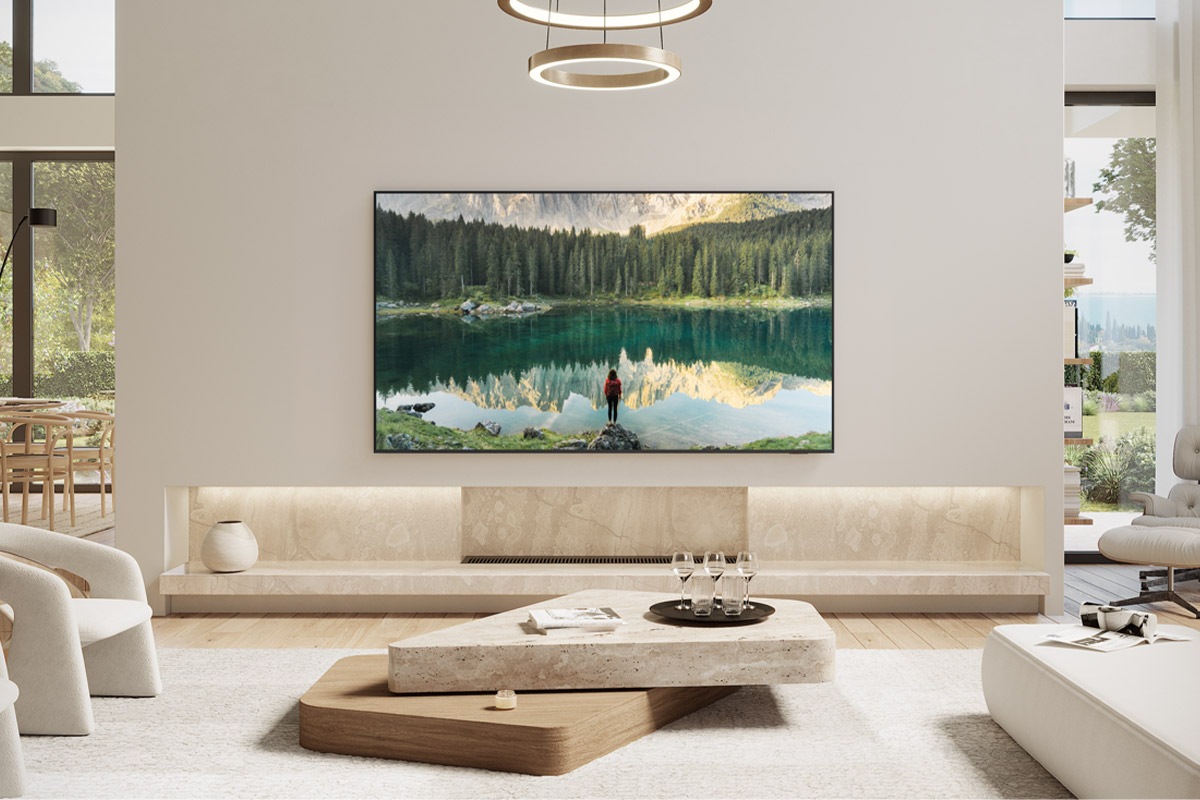 Samsung Neo QLED wall-mounted in a white-toned living room.