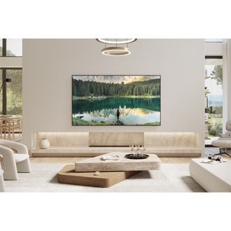 Samsung Neo QLED wall-mounted in a white-toned living room.