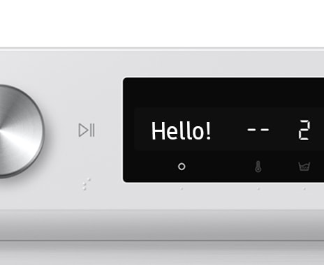 The AI washer’s control panel displays the message “hello!”.