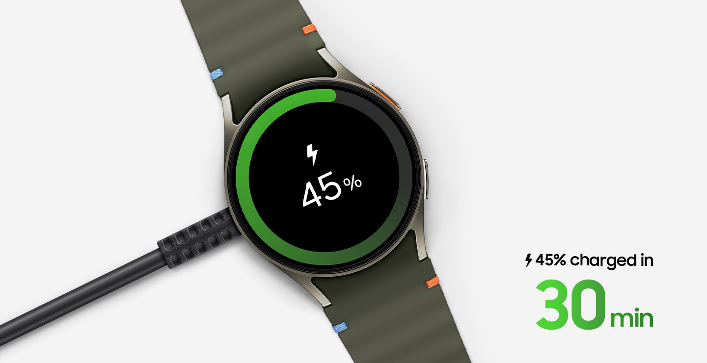 Top view of a Galaxy Watch that's connected to the Galaxy Watch Fast Wireless Charger. The watch displays shows its charging status at 45 percent. The text on the bottom right reads, '45 percent charged in 30 minutes'.