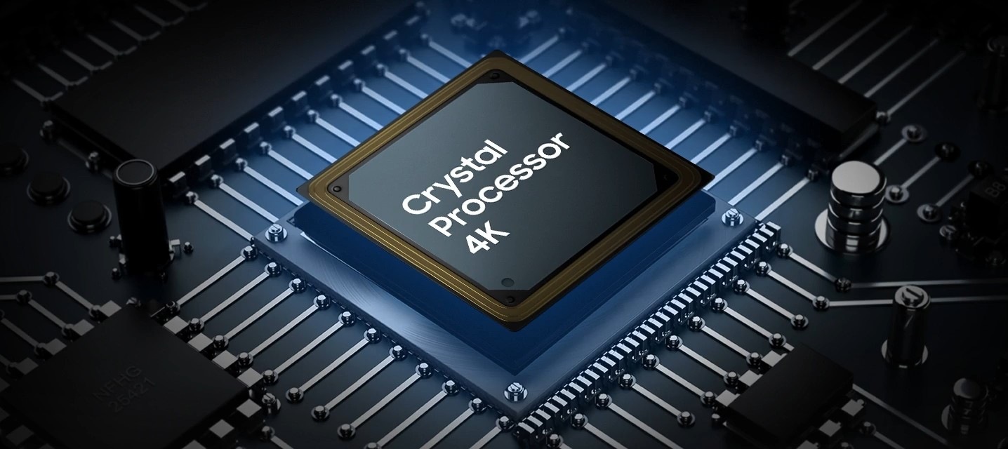 A Samsung Crystal Processor 4K chip is laid out on a TV's main board with glowing power lines.