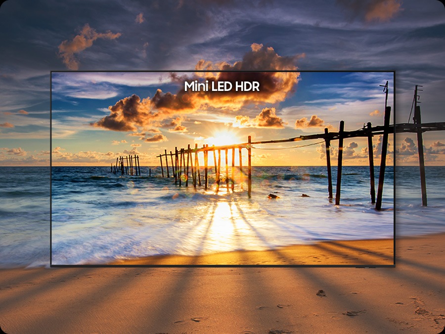 A vivid sunset over the ocean with bright highlights and deep shadows, showcasing Samsung Mini LED HDR’s enhanced contrast, brightness and fine detail across the scene.