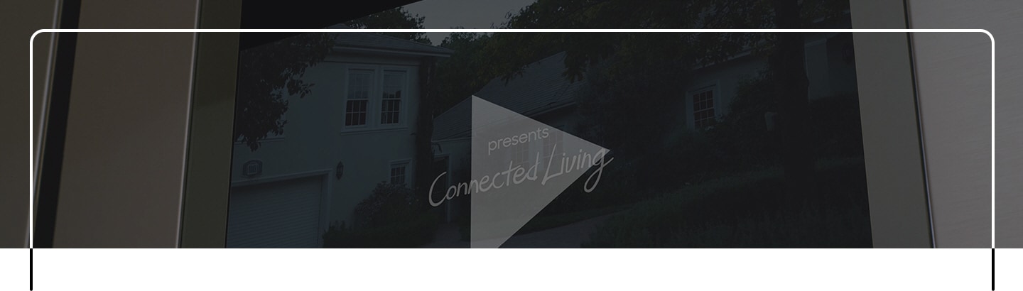 The Family Hub screen has a video play button and the words “presents Connected Living” over top the exterior of a family home.