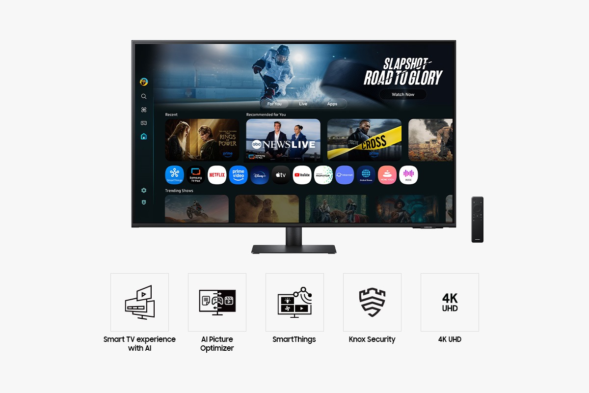 Front of 43 inch Samsung Smart Monitor M7 with the screen showing Smart TV Apps page with various content and apps lined up, and a remote control. Five icons for features about Smart TV experience with AI, AI Picture Optimizer, SmartThings, Knox Security, and 4K UHD.