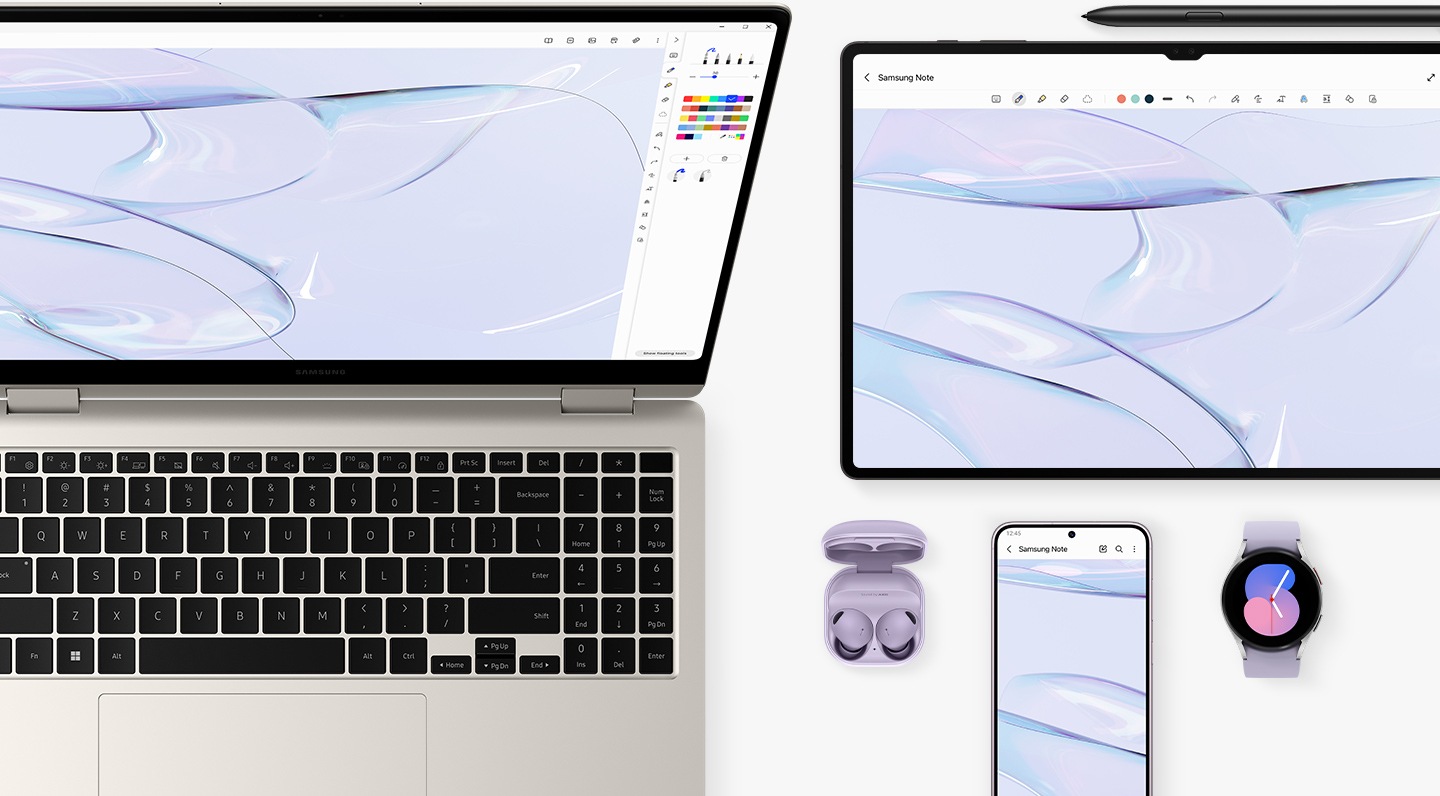 A top view of a Beige Galaxy Book3 Pro 360, opened and facing forward with Adobe Photoshop opened onscreen. A Galaxy Tab S8 Ultra with S Pen, Galaxy S23 Plus smartphone, Galaxy Watch5 Bora Purple and Galaxy Buds2 Pro Bora Purple are placed next to the laptop.