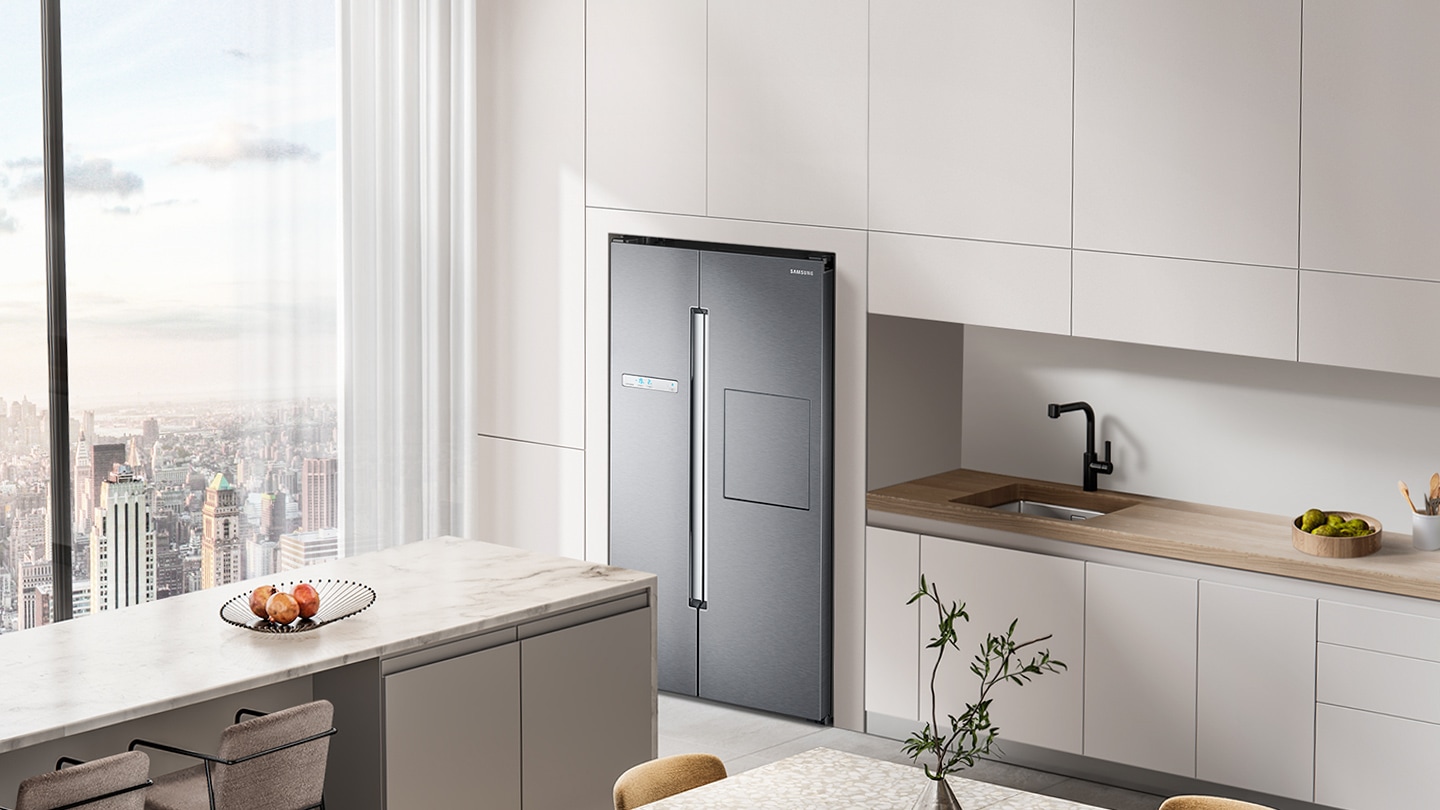 The refrigerator blends seamlessly into the kitchen space, adding to the contemporary style and maximizing space.