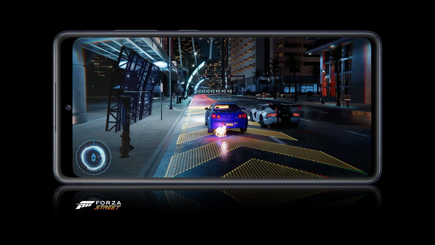 Galaxy S20 FE with a scene from Forza Horizon 4 onscreen showing the detail you can experience in your games with 5G speeds.