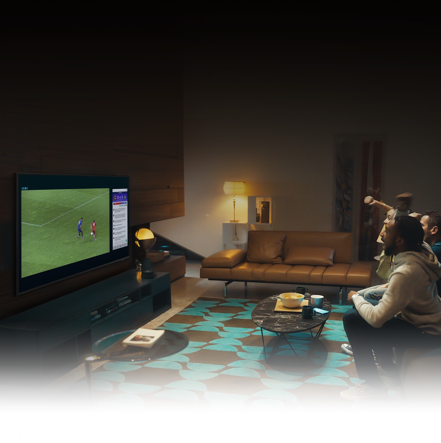 A group of people use UHD TV Multi view feature to enjoy a football match and view play-by-play information at the same time on the same screen.