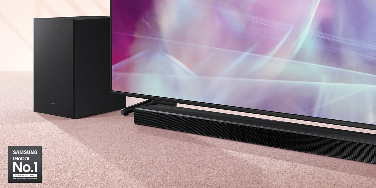 Samsung Global No.1 logo can be seen along with Samsung Q600A Soundbar and subwoofer which are positioned next to QLED TV.
