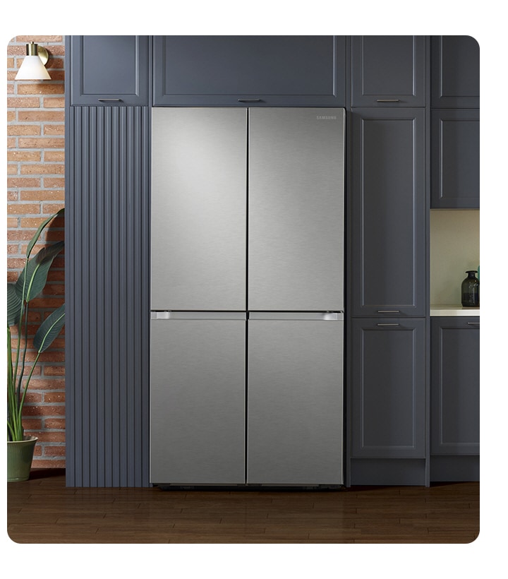 The sleek exterior of the fridge gives a clean look to the modern kitchen, with a flat finish and no recessed handles.