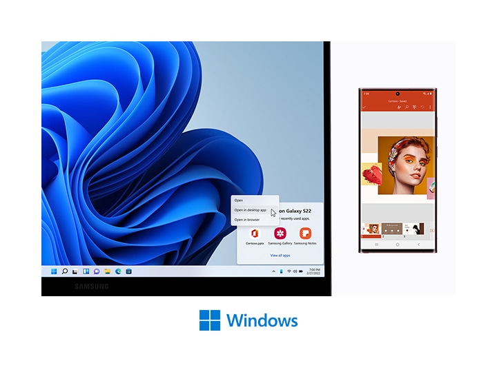A Galaxy Book2 and a Galaxy S22 Ultra are next to each other. On the PC screen, there is a blue wavy wallpaper with a Recent Apps window from mobile in the bottom right corner. Recent Apps are PowerPoint, Samsung Gallery and Samsung Notes. A mouse cursor is on the Open in desktop app button on the PC screen. On a Galaxy S22 Ultra to the right, Microsoft PowerPoint is open with a slide that has color swatches as well as a face of a woman with colorful make up on. Below, there is a Microsoft Windows logo.