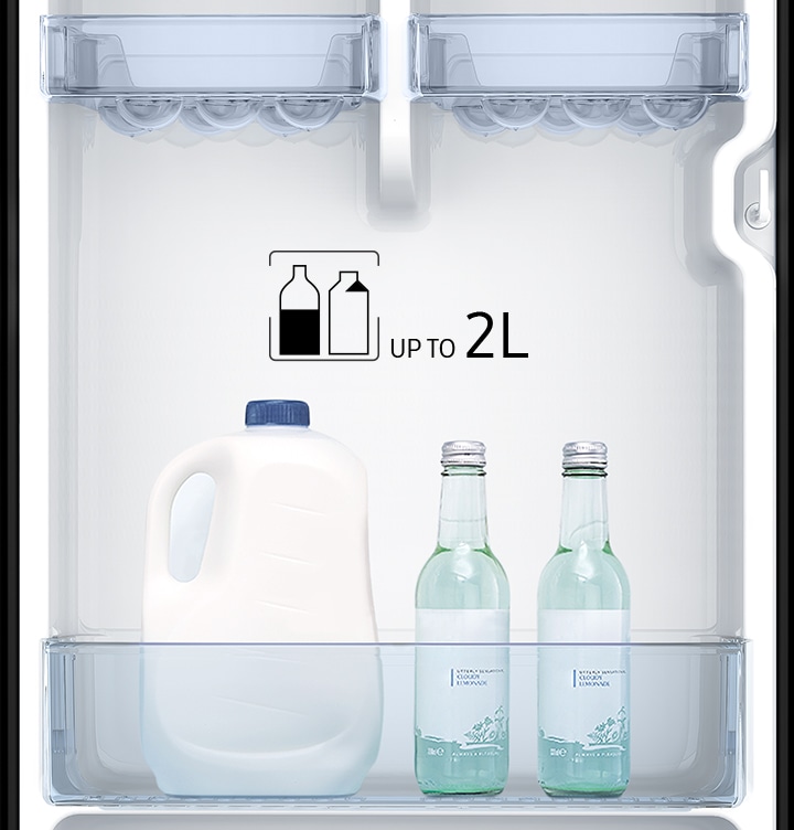 The depth and width of the door-bin are large enough to have room to spare even after storing the bulky milk pack and two bottle of sparkling soda.