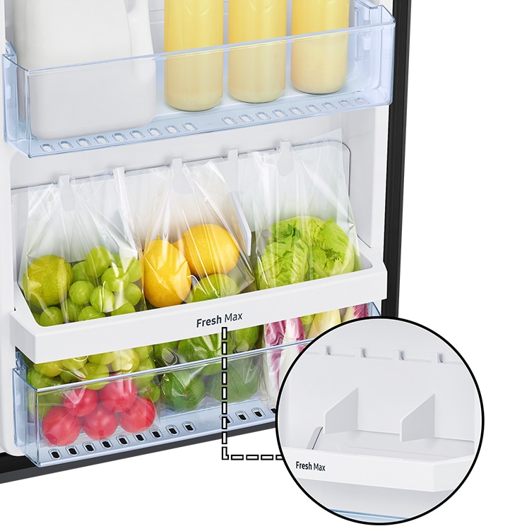 Small bags full of fruits and vegies are hung on the top hook of Fresh max. Special divider can store the bottle safely.